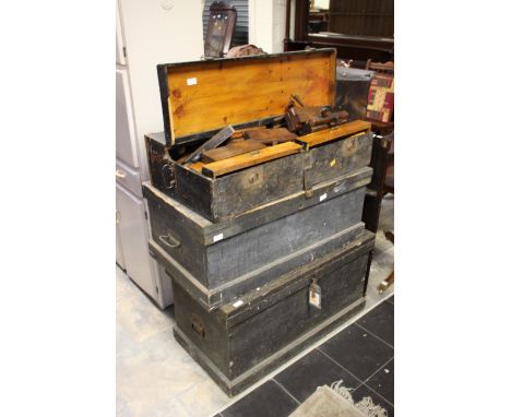 Three carpenters chests containing a large collection of joiners tools, including wood planes, chisels, spirit gauge, etc, so