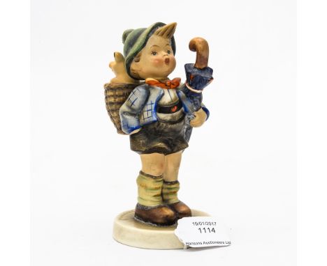 A Goebel model of a boy with umbrella