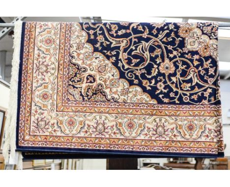 Blue ground Keshan carpet, 230cm x 160cm