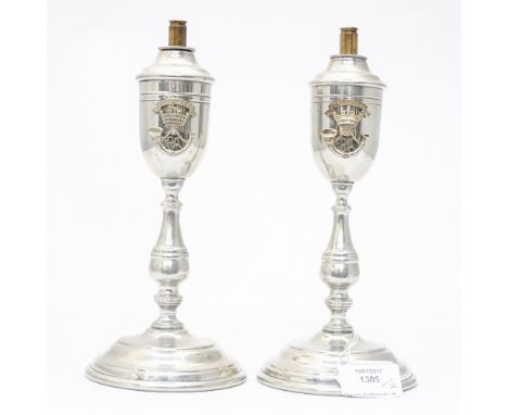 Pair of oil lanterns in candlestick form with contemporary additions of Somerset Light Infantry cap badges affixed, nickle pl