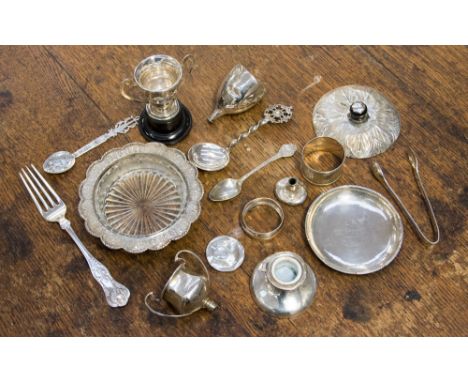 A collection of various silverware comprising white metal butter dish, ink well (af) part trophies, pin dish, napkin ring, th