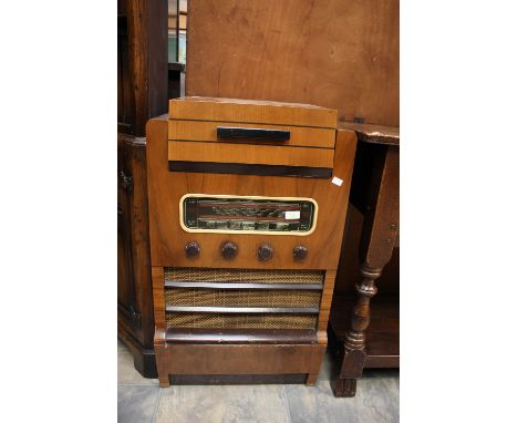 A 1950s radiogram with record player by Garrard 