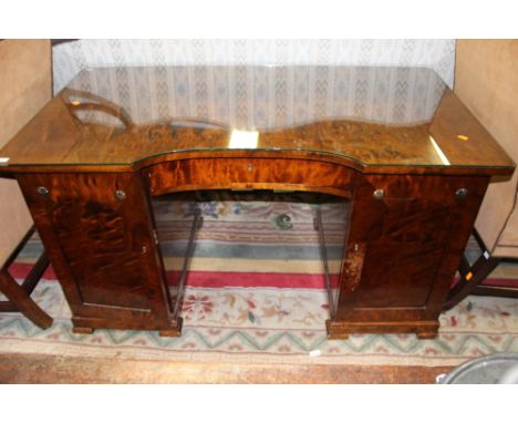 A Continental 19th Century pedestal desk, the front with a single drawer to centre, the right side with a door enclosing five