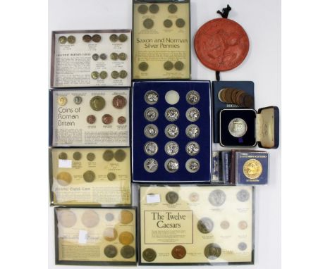 A bag of replica ancient coins, cased Silver Police medalion 1979, Crown 1951 and commemorative crowns.