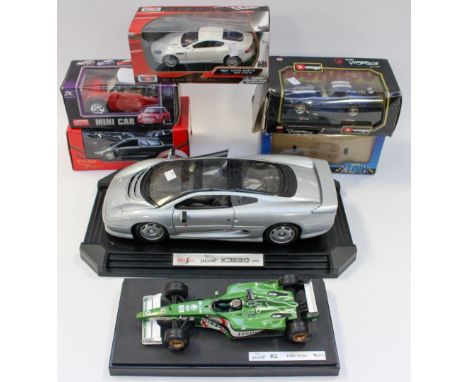 A Maisto Jaguar 1992 X220, with an Eddie Irvine Mattel Jaguar R2 racing, with five further boxed vehicles (seven vehicles) 