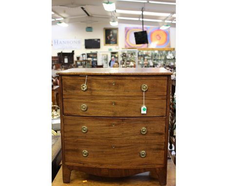 A 19th Century commode in the form of a chest of drawers, with four faux drawers, bracket feet, 71 cm high approx 