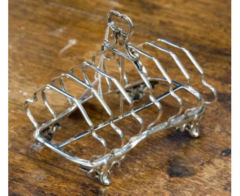 A Victorian silver seven-bar toast rack, Edward & John Barnard, London 1853, 7.88ozt