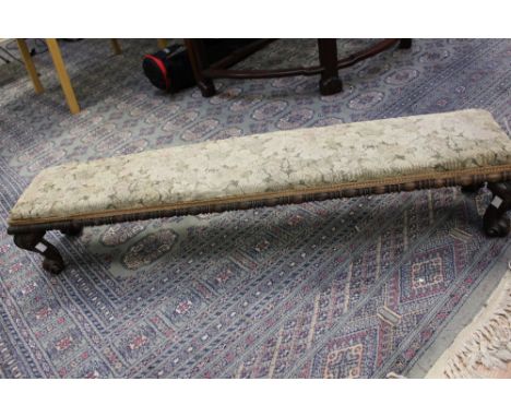 A Victorian mahogany prayer stool, raised on cabriole feet