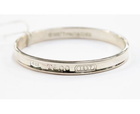 A Tiffany and Co 0.925 bangle circa 1997, celebrating 160 years of the Company 0.94 ozt/29.2 grams approx 
