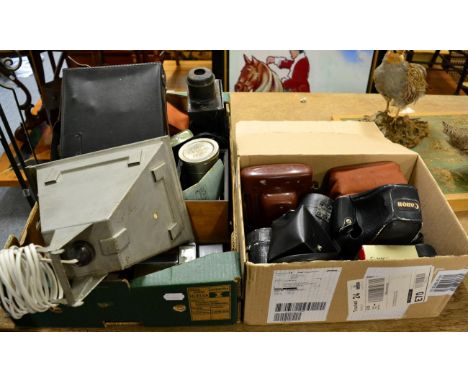 Various photographic equipment (two boxes).   One box includes camera and lens cases the other contains a Polaroid camera as 