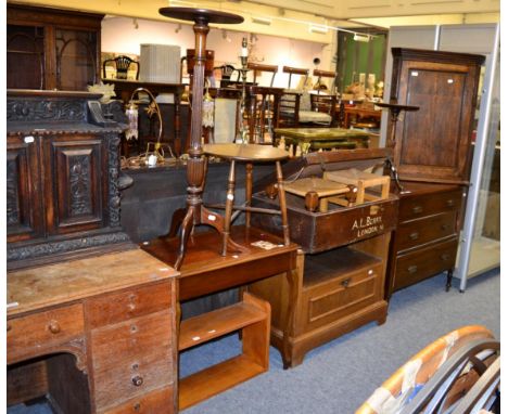 An oak trunk with stencil writing 'A L Berry London'; an oak hanging corner cupboard; a mahogany torchere; two ropework stool