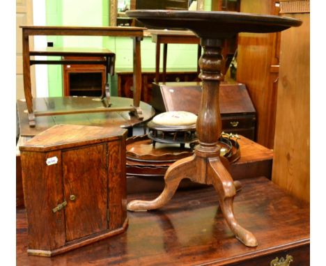 A George III mahogany dish topped tripod table; together with an oak hanging corner cupboard of small proportions 