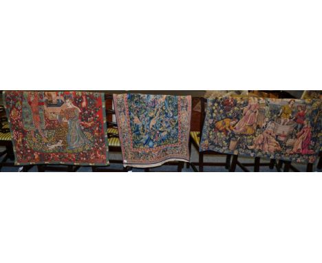 Three French 20th century tapestry wall hangings, comprising an orange, blue and green example depicting birds and flowers, m