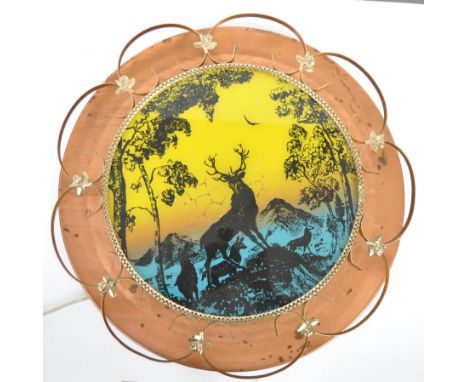 A retro vintage 20th Century copper, brass and glass wall lamp light having a copper disc back and wire worked surround with 
