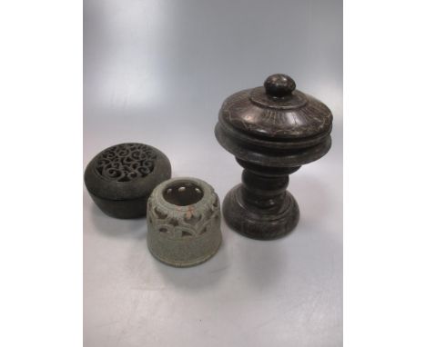 A Chinese carved black stone censer and cover in archaic style, scroll pierced cover, and incised detail,13cm diameter; a sto