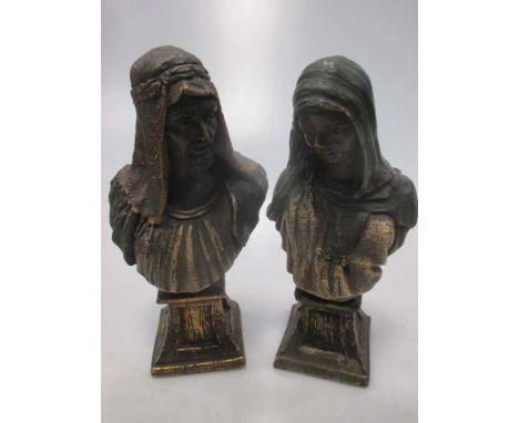 A small pair of Goldscheider busts, each signed to reverse, 17cm high (A/F)
