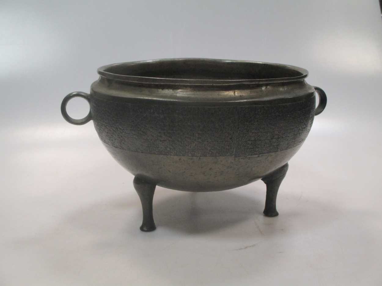 A Chinese bronze Tripod bowl, Ding, in Eastern Zhou style, the body ...