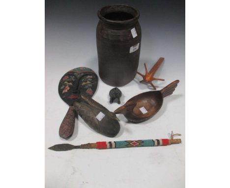A group of tribal/ethnic decorative objects, including a face-back hand mirror, wooden pot, bird vessel etc