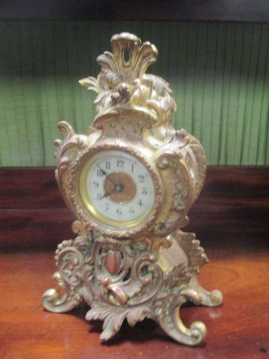 A postman's alarm wall clock, a Vienna type drop dial wall clock and a