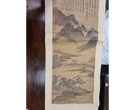 A Chinese scroll painting, Qing Dynasty, depicting scholars in a pavilion in a vast mountain landscape, extensive inscription