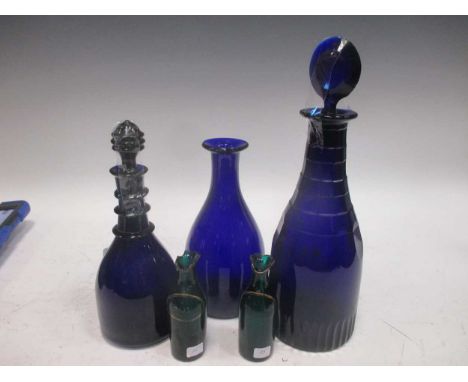 An 18th Century small decanter, a large decanter &amp; carafe &amp; condiments - ketchup &amp; soy, and PR Facet cut condimen