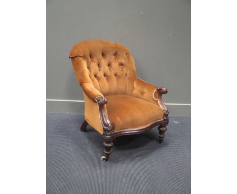 A Victorian mahogany framed armchair, on white ceramic castorsCondition report: damaged