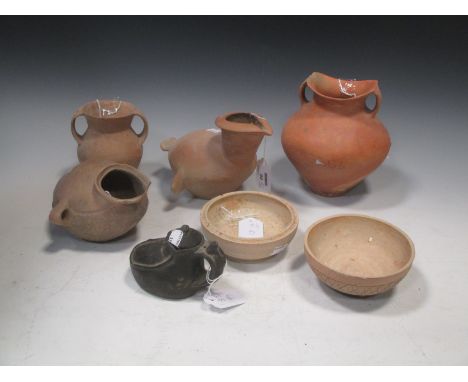 A group of six Chinese neolithic ceramic vessels, including a red pottery two-handles jar, Siwa culture (type) 17cm high (6)