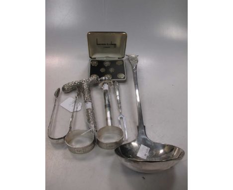 George III silver sugar tongs, 2 napkin rings, 8 plated buttons by Benson and Clegg, an Indian embossed cane handle and anoth