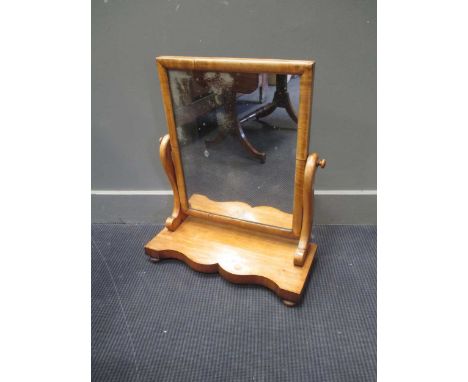 A dressing table mirror 54cm wide together with a wall mirror 82 x 56cm (2)