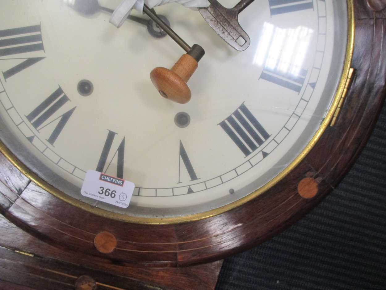 A postman's alarm wall clock, a Vienna type drop dial wall clock and a