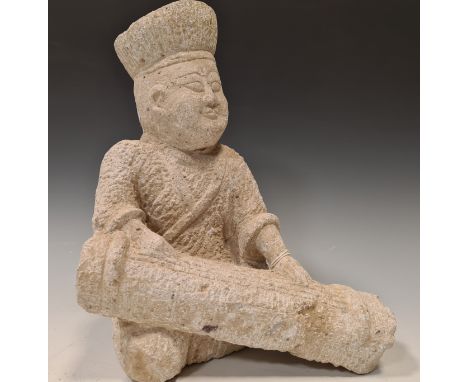 A Chinese carved grey stone figure of a musician playing the zither, in Tang style, with high headress, 31cm