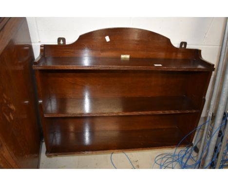 An early 20th Century mahogany wall shelf, labelled Fairfield, Glasgow, approx width 85cm