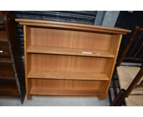 A modern golden oak wall shelf, width approx. 91cm, height 84cm