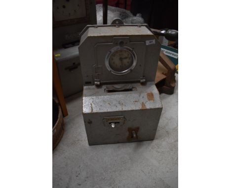 A vintage Blick time recorder clock