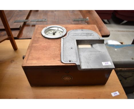 A vintage Blick Stasine time recorder clock