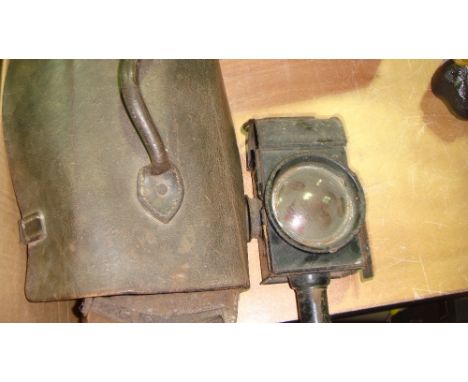 Antique coaching lamp and vintage leather work bag
