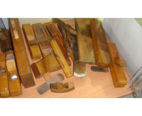 Shelf of vintage wooden wood working planes assorted sizes some round bottom moulding planes 
