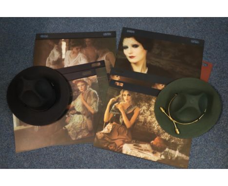 Two Stratton USA hats in original boxes together with a Pirelli calendar.  (B.P. 21% + VAT) 