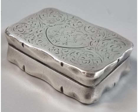 Silver snuff box with hinged foliate engraved cover.  Birmingham hallmarks.  1.5 troy oz approx.  5.5cm wide approx.   (B.P. 
