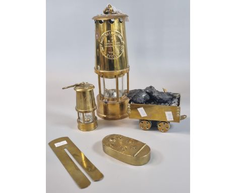 Collection of brassware to include: miner's lamps, miner's snuff box, miniature wagon with coal etc.  (5)  (B.P. 21% + VAT) 