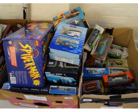 Two boxes of assorted diecast model vehicles, varying scales in original boxes to include: Matchbox, Dinky, Promotional , Mai