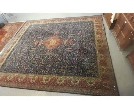 Large Persian style Axminster type carpet with dark blue field, birds, animals and foliage.  456x368cm approx.   (B.P. 21% + 