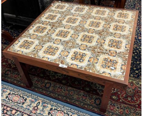 Mid century design, probably Danish, tile top coffee table of square form with repeating designs.  86cm square, 43cm high app