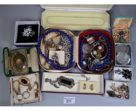 Plastic box of costume and some silver jewellery to include: silver bangle, coin bracelet, earrings, necklaces, watches, pear