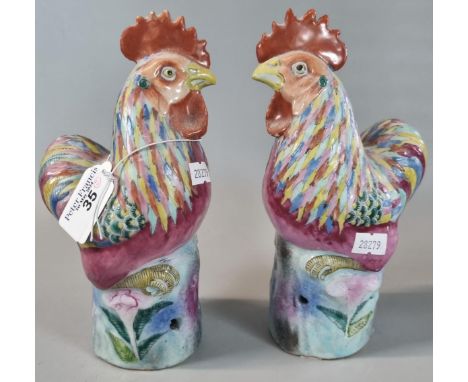 Pair of ceramic polychrome studies of cockerels. 20cm high approx. (B.P. 21% + VAT)