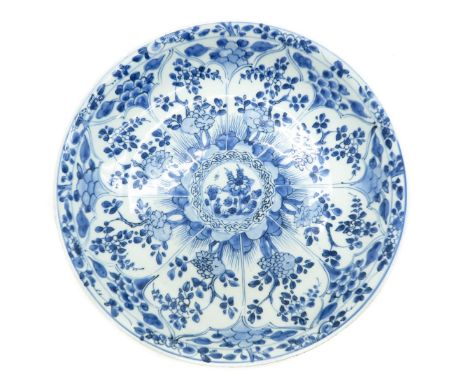 Kangxi, blue and white decor of flowers, marked with a double ring and conch shell, 35 cm. in diameter. chip and hairline.