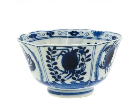 18th Century, Kangxi, fully decorated with fish and crab, marked with double ring and 4 characters, 10 cm. in diameter. 