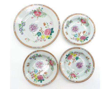 Famille Rose decor, including 3 small plates and a dinner plate 23 cm. in diameter, chip and hairline.