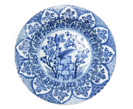 Kangxi, blue and white floral decor border with trees and bird in the center of plate, marked with double ring and flower on 