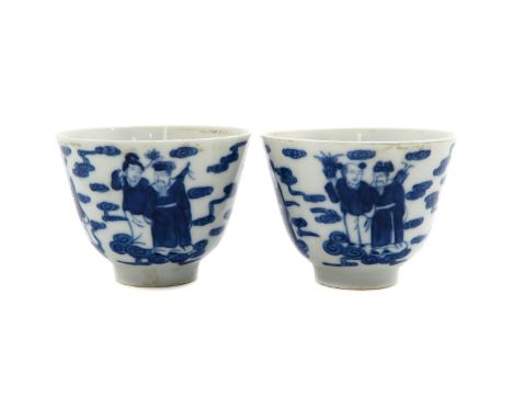 Blue and white decor of Chinese people, marked with jade mark on the bottom, 8 cm. in diameter.